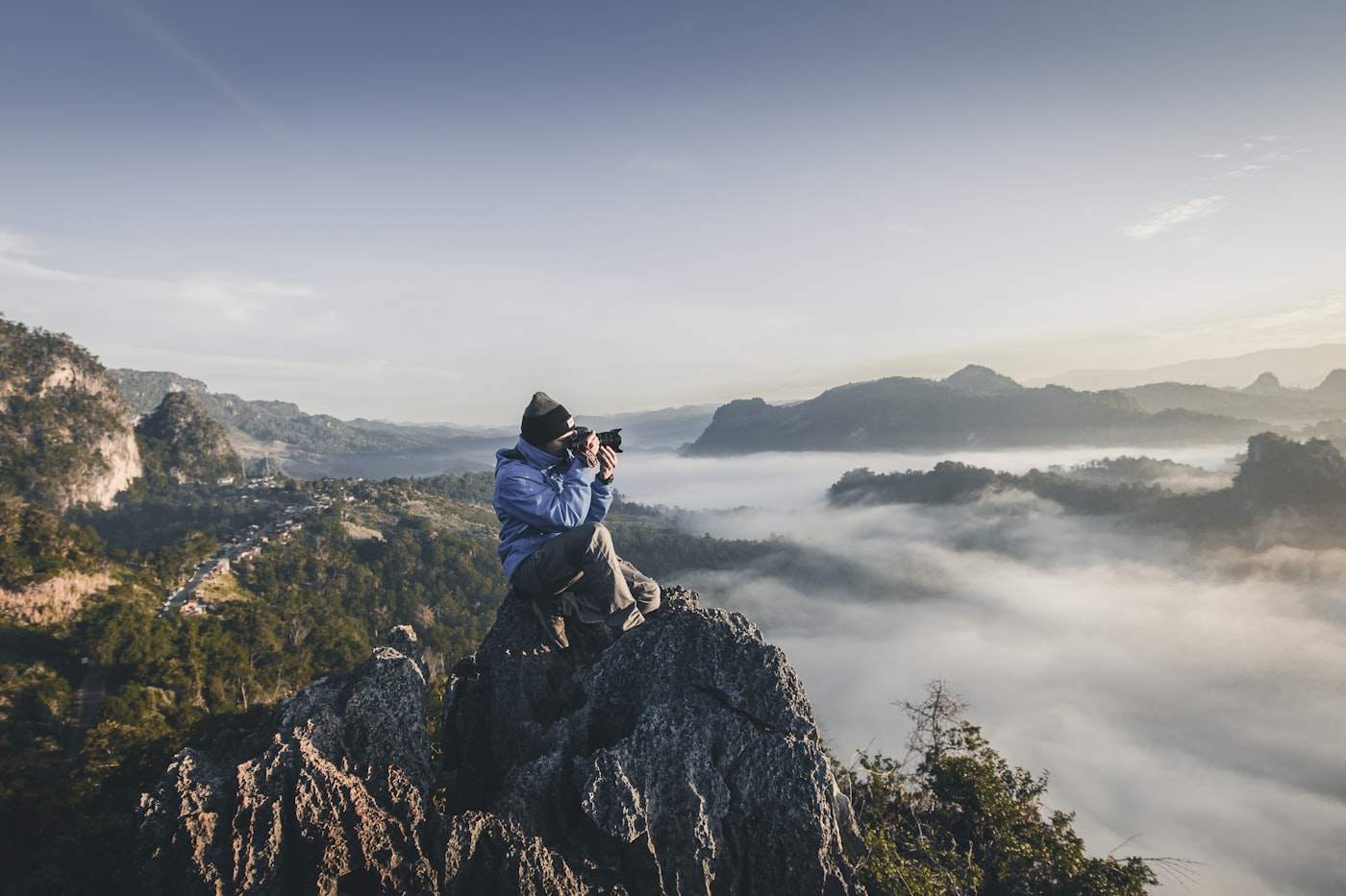 Photographer capturing a scenic view